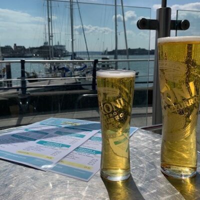 Pints on an outdoor table at the Spinnaker Kitchen & Bar